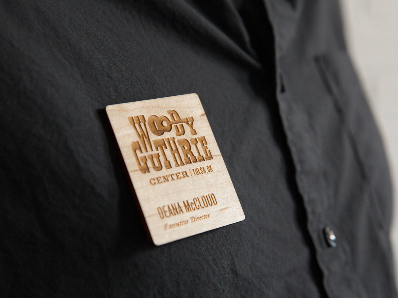 Wooden Woody Guthrie Center name tag