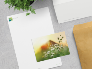 Image of SWT Design's stationary and postcard on a desktop