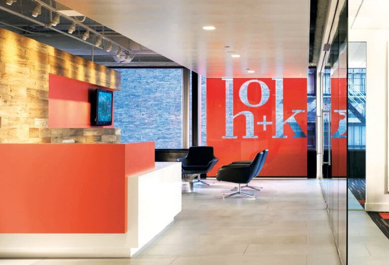 Photo of HOK offices with logo display