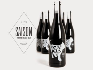 Le Chat Putain branded beer bottles and saison mark