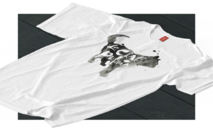 Le Chat Putain t-shirt front, laying on table