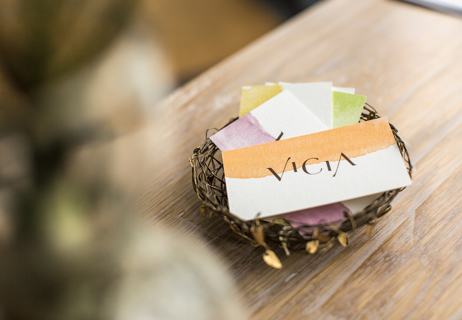Vicia business cards in basket