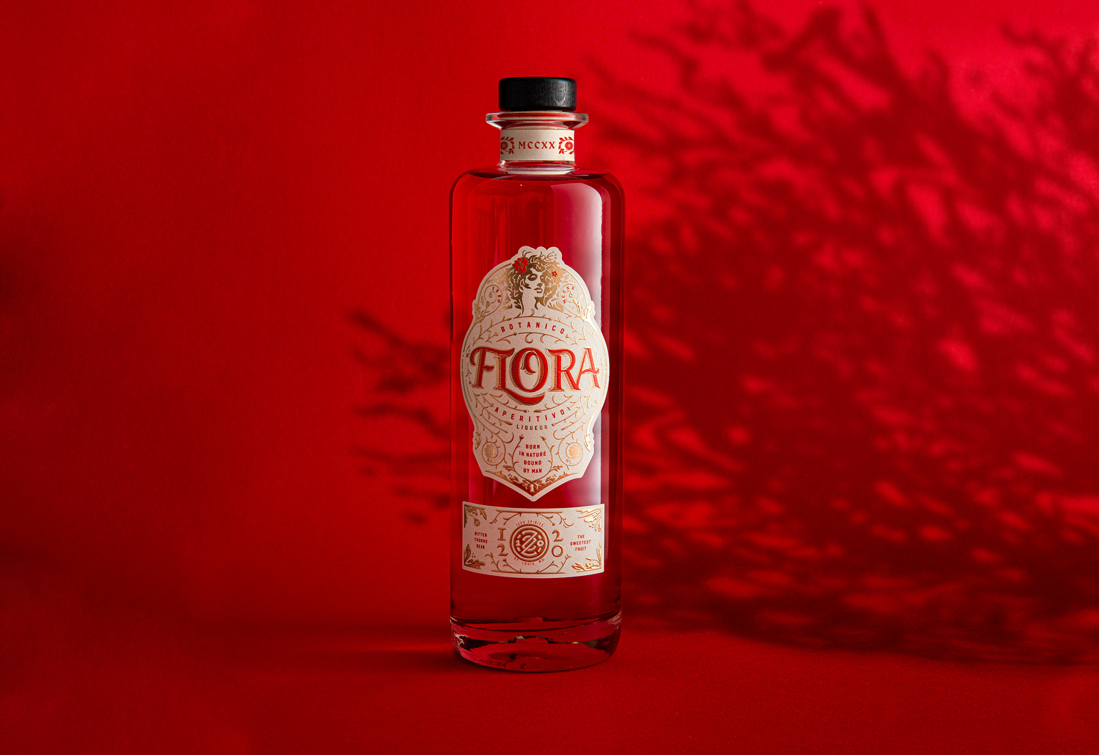 Flora bottle, red background, shadow