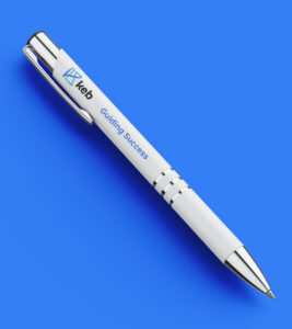 KEB branded pen with "Guided Success" tagline